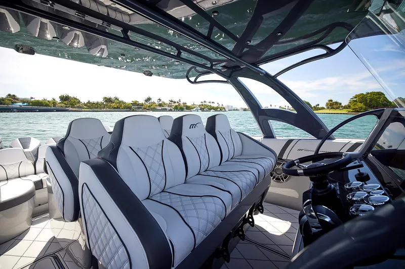 Slide: The Image of Luxurious interior of 2022 Midnight Express 43 Open boat with plush seating and modern design. - 25