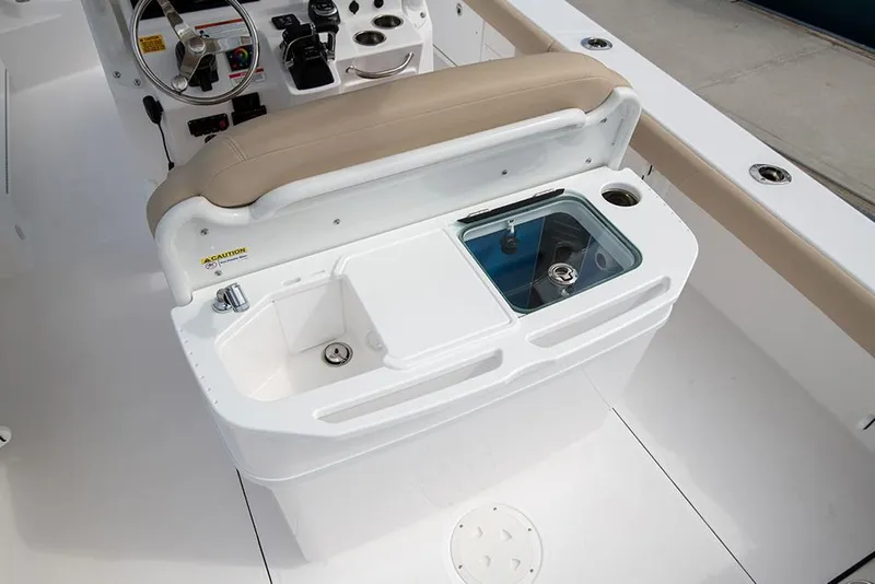 Slide: The Image of Manufacturer Provided Image: 2025 Everglades 273 Center Console boat interior with helm and seating area. - 11