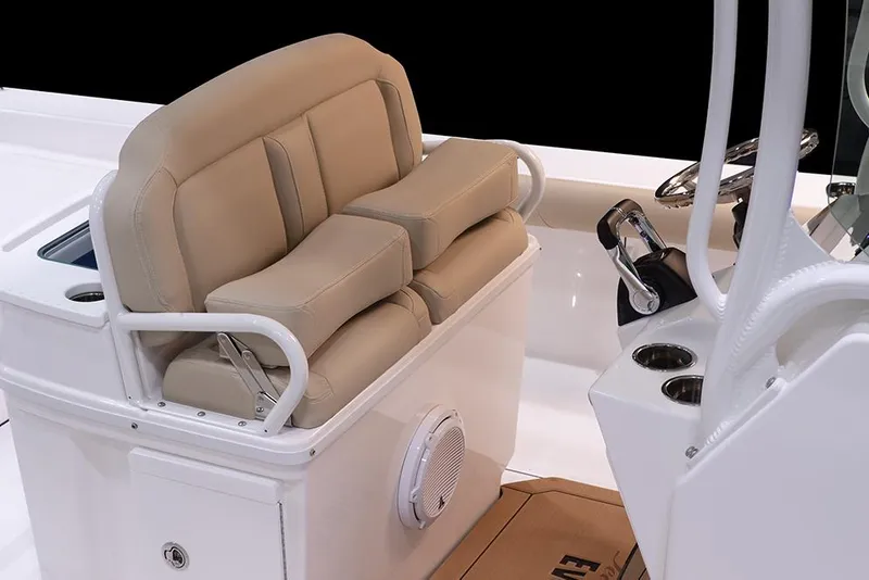 Slide: The Image of Manufacturer Provided Image: 2025 Everglades 273 Center Console boat interior with beige seating and steering console. - 12