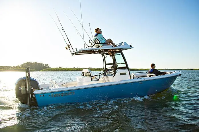 Slide: The Image of Manufacturer Provided Image: 2025 Everglades 273 Center Console boat cruising on open water. - 3