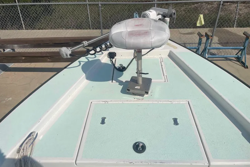 Slide: The Image of Bow of a 2014 Lifetyme 2070 boat with mounted equipment and storage compartments. - 4