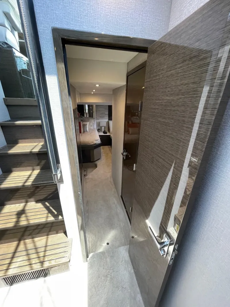 Slide: The Image of Interior view of 2019 Cruisers 50 Cantius yacht, featuring modern design and sleek finishes. - 17