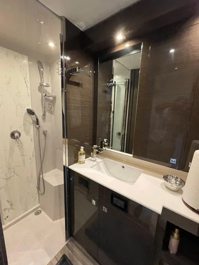 Slide: The Image of Luxurious bathroom in 2019 Cruisers 50 Cantius yacht with modern fixtures and elegant design. - 20