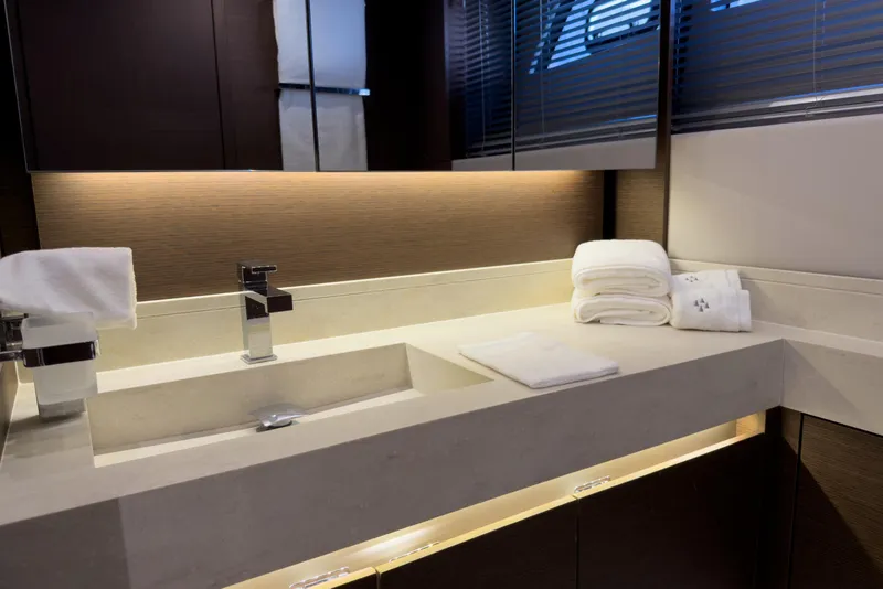 Slide: The Image of Luxurious bathroom in the 2023 Prestige 520 yacht model. - 12