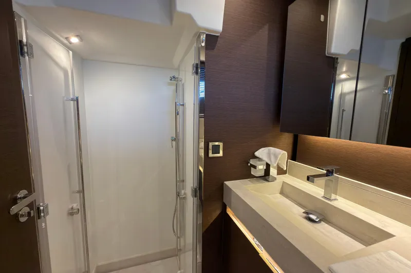 Slide: The Image of Luxurious bathroom on the 2023 Prestige 520 yacht model. - 14