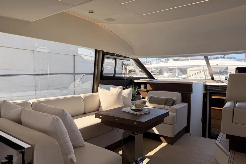 Slide: The Image of Luxurious interior of 2023 Prestige 520 yacht with elegant seating and modern design. - 6