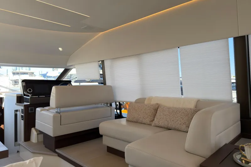 Slide: The Image of Luxurious interior of 2023 Prestige 520 yacht with elegant seating and modern design. - 7