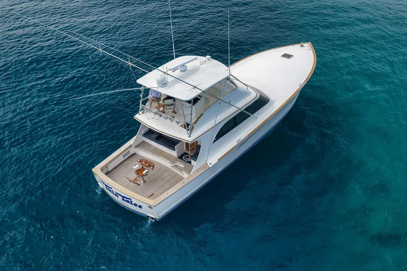 Slide: The Image of Aerial view of 1999 Hines-Farley SPORTFISHERMAN yacht on clear blue water. - 12