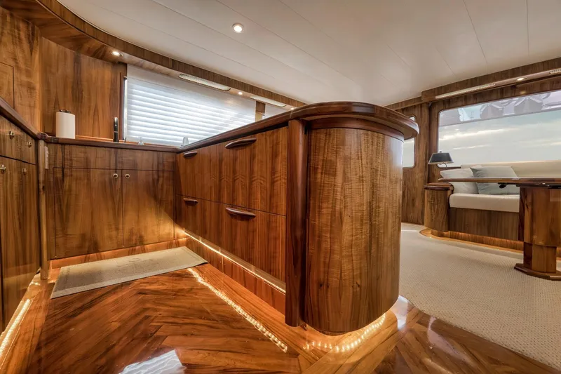Slide: The Image of Luxurious 1999 Hines-Farley SPORTFISHERMAN yacht interior with elegant wood finishes and modern design. - 31