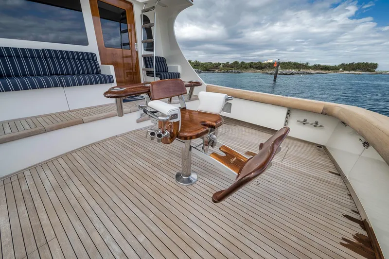 Slide: The Image of 1999 Hines-Farley SPORTFISHERMAN yacht deck with fishing chair and ocean view. - 40