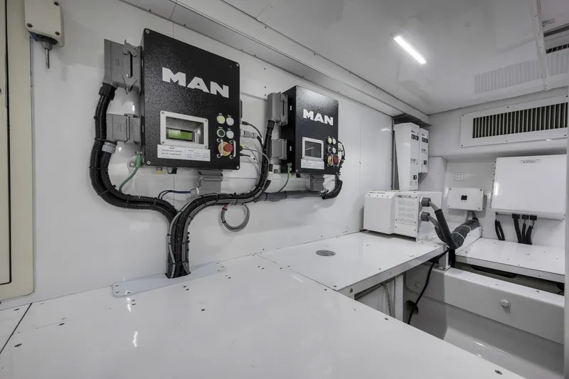 Slide: The Image of Engine room of 1999 Hines-Farley SPORTFISHERMAN with MAN control panels. - 72