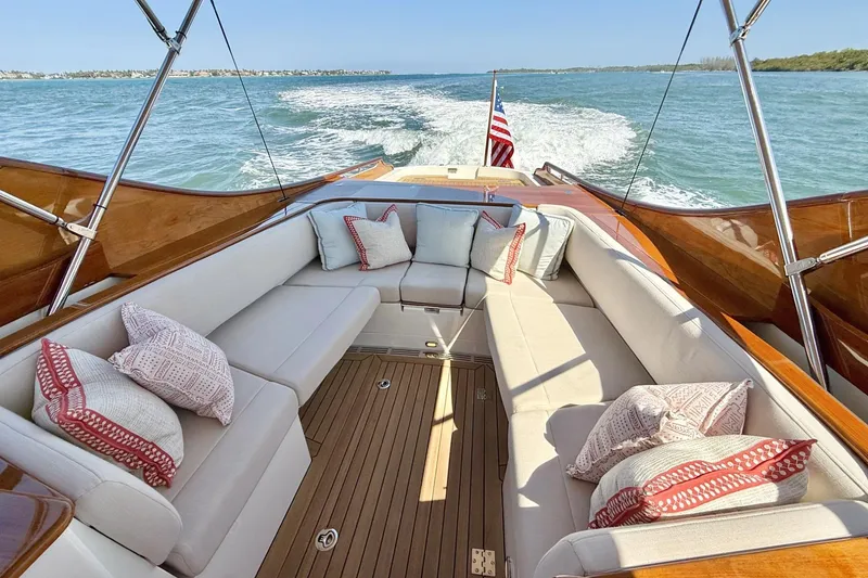 Slide: The Image of Luxurious 2017 Hinckley Talaria 34R yacht interior with elegant seating and ocean view. - 5