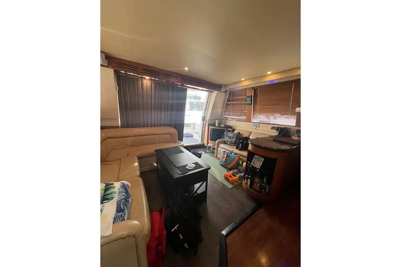 Slide: The Image of Interior of 2000 Carver 530 Voyager Pilothouse with cozy seating and modern amenities. - 13