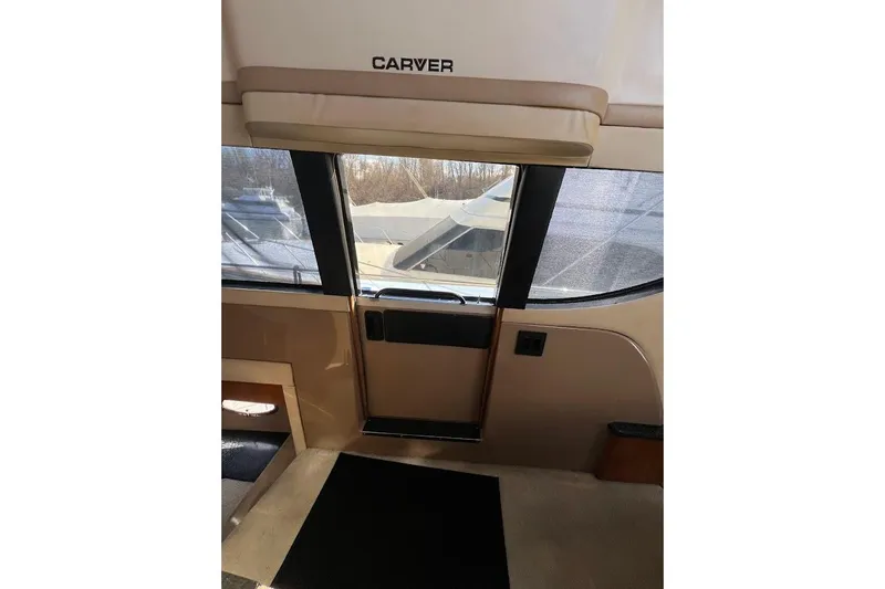 Slide: The Image of Interior view of 2000 Carver 530 Voyager Pilothouse with window and door. - 18