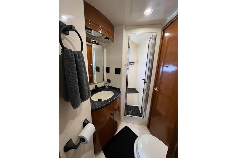 Slide: The Image of Bathroom interior of 2000 Carver 530 Voyager Pilothouse with sink, shower, and toilet. - 22