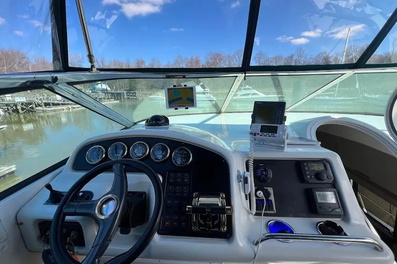 Slide: The Image of Pilothouse of 2000 Carver 530 Voyager with steering wheel and navigation instruments. - 7