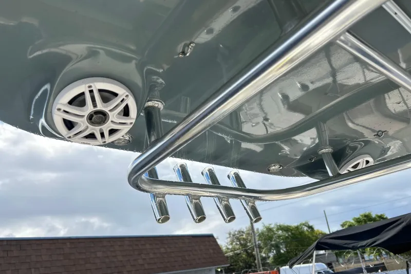 Slide: The Image of 2019 Key West 239 FS boat with stainless steel rod holders and marine speaker. - 13