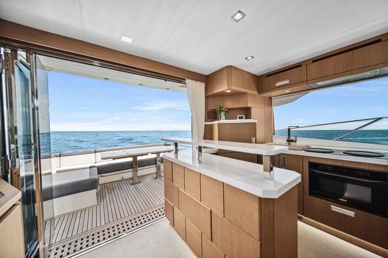 Slide: The Image of Luxurious interior of 2019 Galeon 560 Sky yacht with ocean view. - 18