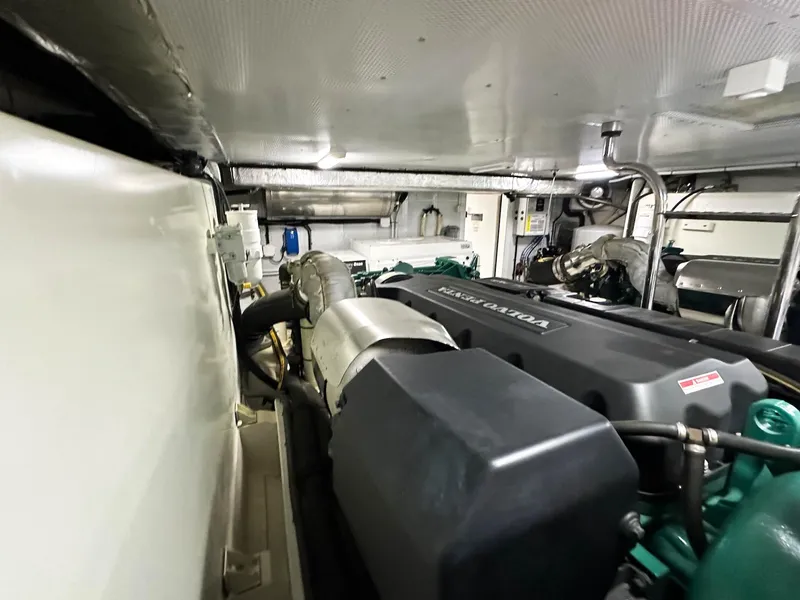 Slide: The Image of Engine room of 2019 Galeon 560 Sky yacht, featuring modern machinery and equipment. - 28