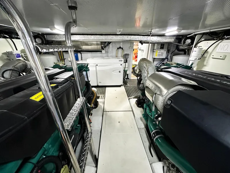Slide: The Image of Engine room of 2019 Galeon 560 Sky yacht, showcasing dual engines and equipment. - 29