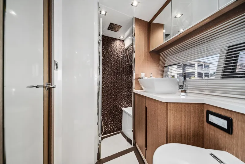 Slide: The Image of Luxurious bathroom interior of 2019 Galeon 560 Sky yacht with modern fixtures. - 7