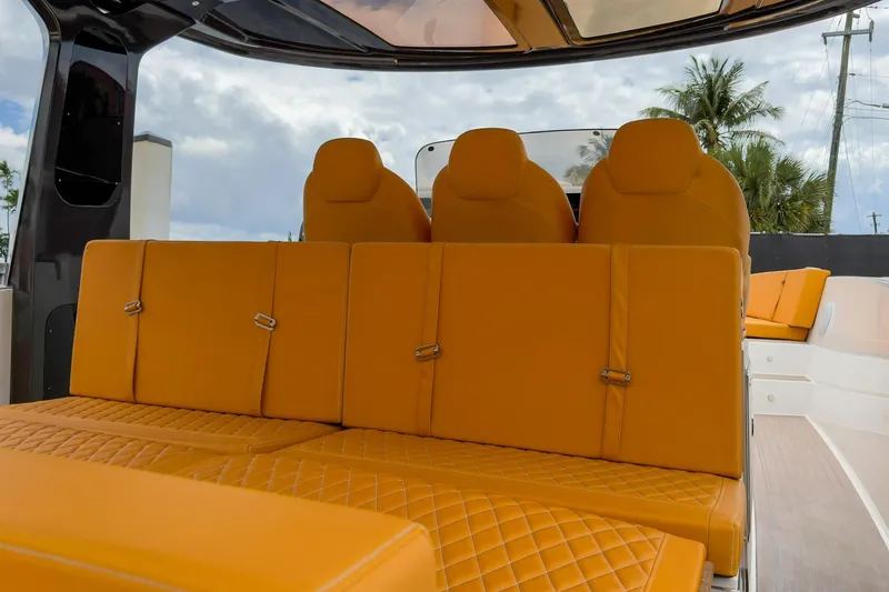 Slide: The Image of Luxurious orange seating on 2024 Tesoro T40 boat, featuring modern design and comfort. - 22