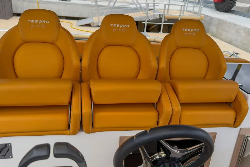 Slide: The Image of Luxurious orange seats on a 2024 Tesoro T40 yacht, showcasing premium design. - 24