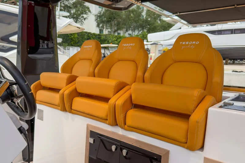 Slide: The Image of Luxurious orange seats on a 2024 Tesoro T40 yacht, showcasing premium design. - 26