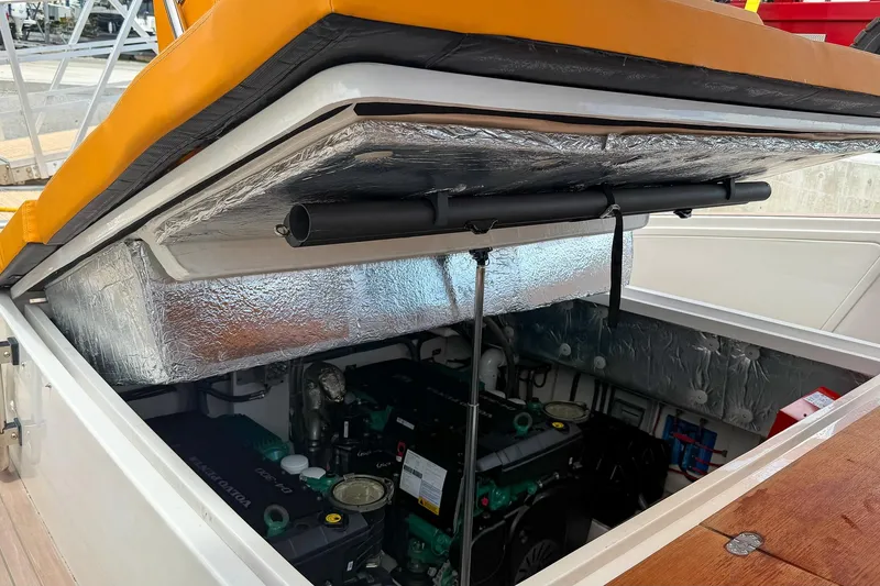 Slide: The Image of 2024 Tesoro T40 engine compartment with open hatch, showcasing insulated interior. - 47
