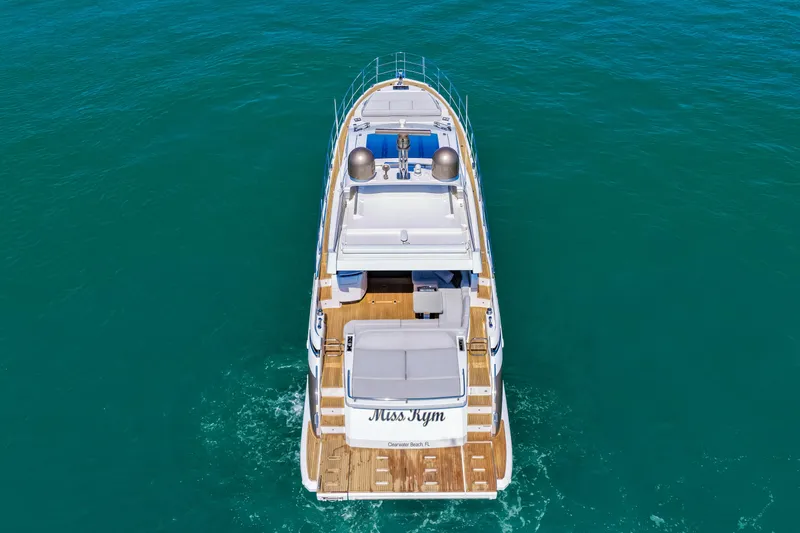 Slide: The Image of Aerial view of 2020 Azimut S6 yacht cruising on clear blue water. - 29