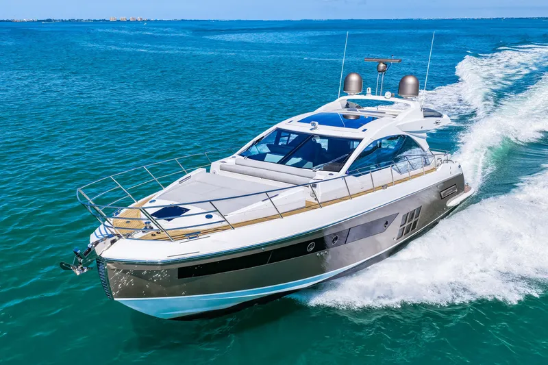 Slide: The Image of 2020 Azimut S6 yacht cruising on clear blue ocean waters. - 75