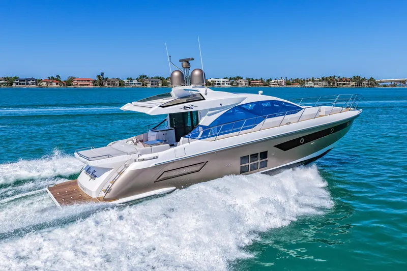 Slide: The Image of Luxury 2020 Azimut S6 yacht cruising on clear blue waters. - 46