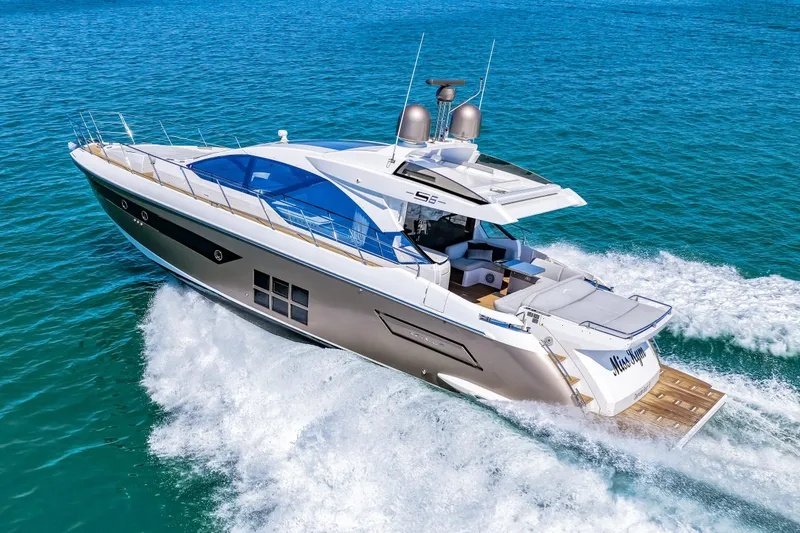 Slide: The Image of 2020 Azimut S6 yacht cruising on open water, showcasing sleek design and luxury features. - 63