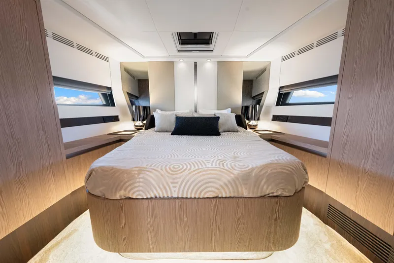Slide: The Image of Luxurious bedroom interior of 2020 Azimut S6 yacht with modern design and elegant bedding. - 110