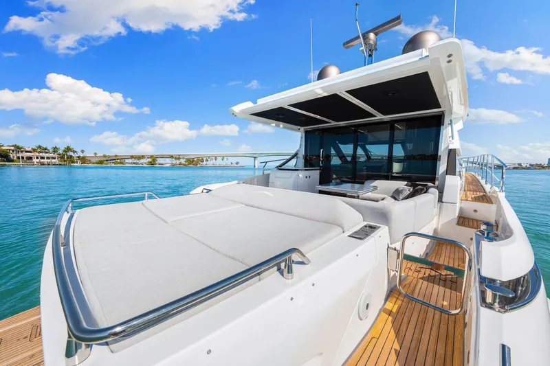 Slide: The Image of Luxurious 2020 Azimut S6 yacht with spacious deck, cruising on serene blue waters. - 79