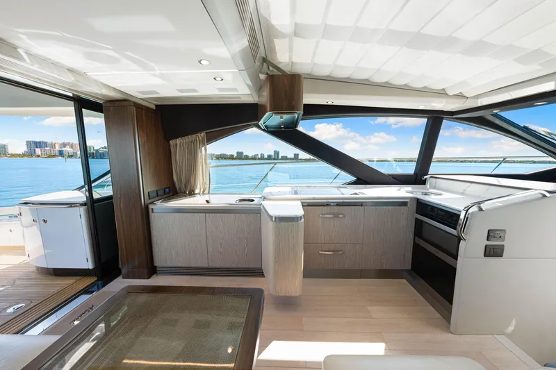 Slide: The Image of Luxurious interior of 2020 Azimut S6 yacht with modern kitchen and scenic ocean view. - 93