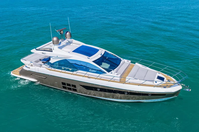 Slide: The Image of Luxurious 2020 Azimut S6 yacht cruising on clear blue waters. - 41
