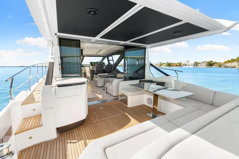 Slide: The Image of Luxurious 2020 Azimut S6 yacht interior with spacious seating and scenic ocean view. - 78