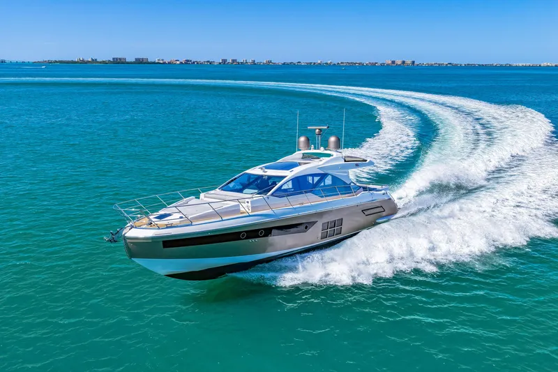 Slide: The Image of 2020 Azimut S6 yacht cruising on clear blue ocean waters. - 57