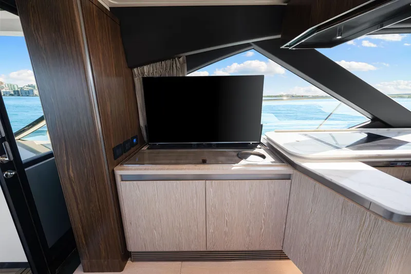 Slide: The Image of Luxurious interior of 2020 Azimut S6 yacht with modern cabinetry and ocean view. - 95