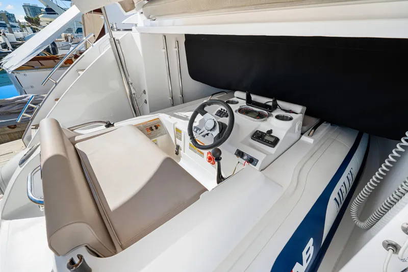 Slide: The Image of Cockpit of 2020 Azimut S6 yacht with steering wheel and control panel. - 87