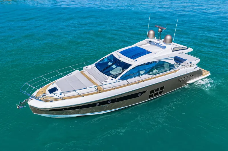 Slide: The Image of 2020 Azimut S6 luxury yacht cruising on clear blue water. - 5