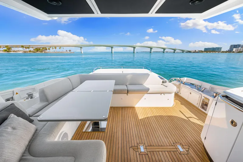 Slide: The Image of Luxurious 2020 Azimut S6 yacht deck with scenic ocean view and modern seating. - 84
