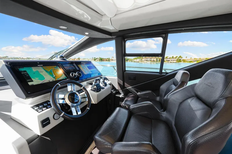 Slide: The Image of Luxurious 2020 Azimut S6 yacht cockpit with modern navigation system and leather seating. - 99