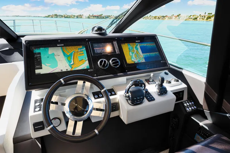 Slide: The Image of Cockpit of 2020 Azimut S6 yacht with advanced navigation displays and controls. - 100