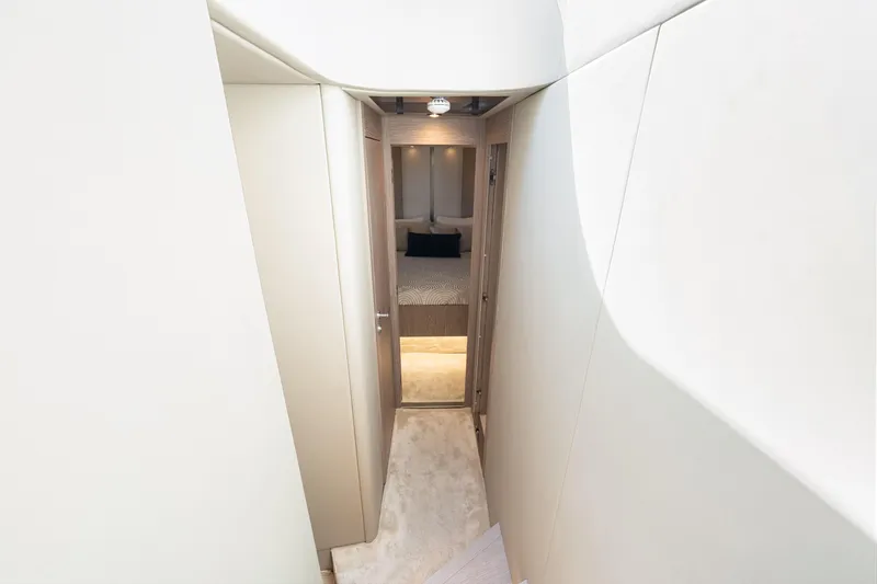 Slide: The Image of Interior hallway leading to a bedroom on a 2020 Azimut S6 yacht. - 101