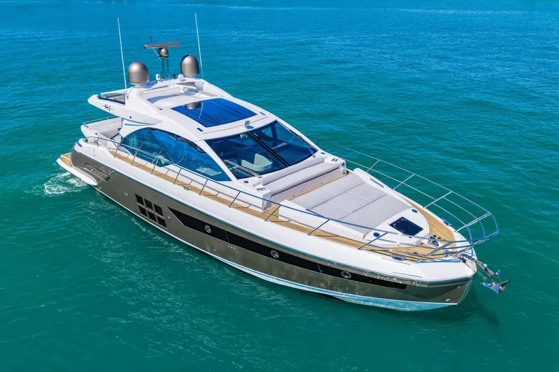 Slide: The Image of 2020 Azimut S6 luxury yacht cruising on clear blue waters. - 40