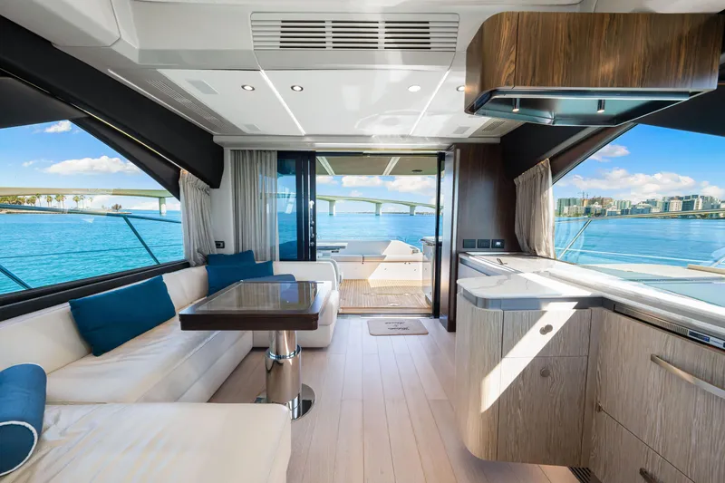 Slide: The Image of Luxurious interior of 2020 Azimut S6 yacht with ocean view and modern furnishings. - 91