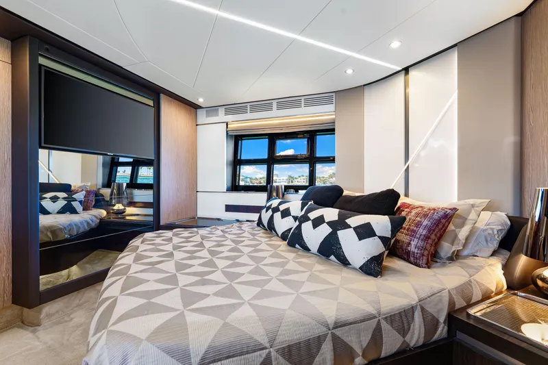 Slide: The Image of Luxurious bedroom interior of 2020 Azimut S6 yacht with modern design and elegant decor. - 105