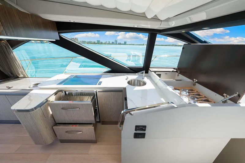 Slide: The Image of Luxurious interior of 2020 Azimut S6 yacht with modern kitchen and ocean view. - 97